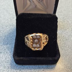 14 karat gold ring with five diamonds