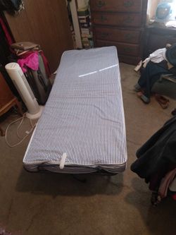 Rolling Metal Bed Frame With 4" Mattress