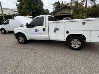 Selling a nice Ford 2006 utility work truck 8 foot bed