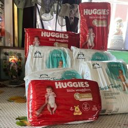4 Huggies Little Snugglers Size 4 Mama Bear Size 5 Diapers 