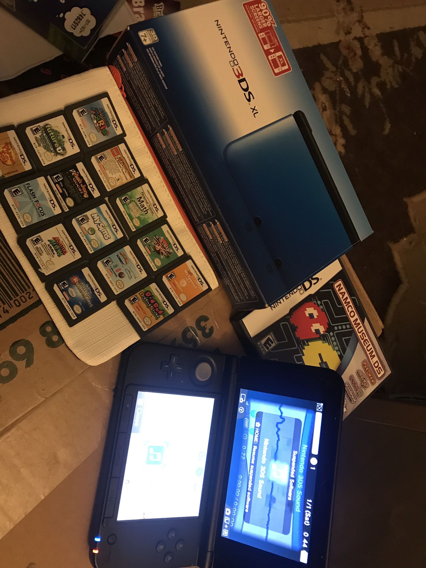 Nintendo 3DS XL Blue with 15 DS games and 8 3DS games