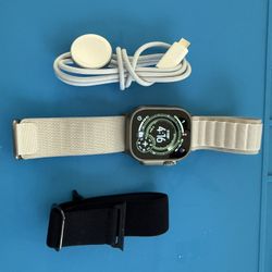 Apple Watch Ultra GPS+ cellular  49mm titanium & ceramic , sapphire crystal, 99% battery capacity.