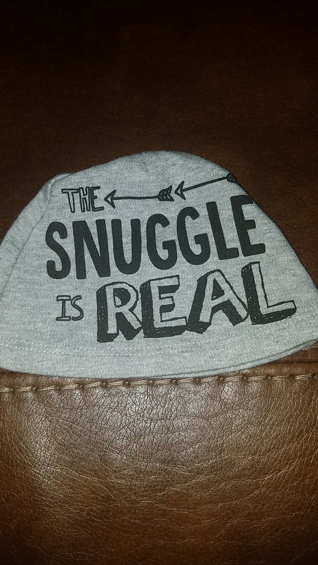 The Snuggle is REAL hat 0 to 6 months