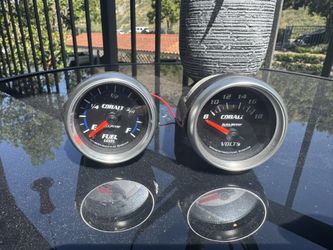 Auto Meter Volt And Fuel Level Gauge