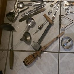 Vintage kitchen items, aluminum pitcher, bundt pan, coors bottle openers, pizza cuttrr, juicer, meat hammer, funnel, wine opener, cookie cutter, measu