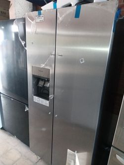New Frigidaire stainless steel side by side refrigerator and repairs