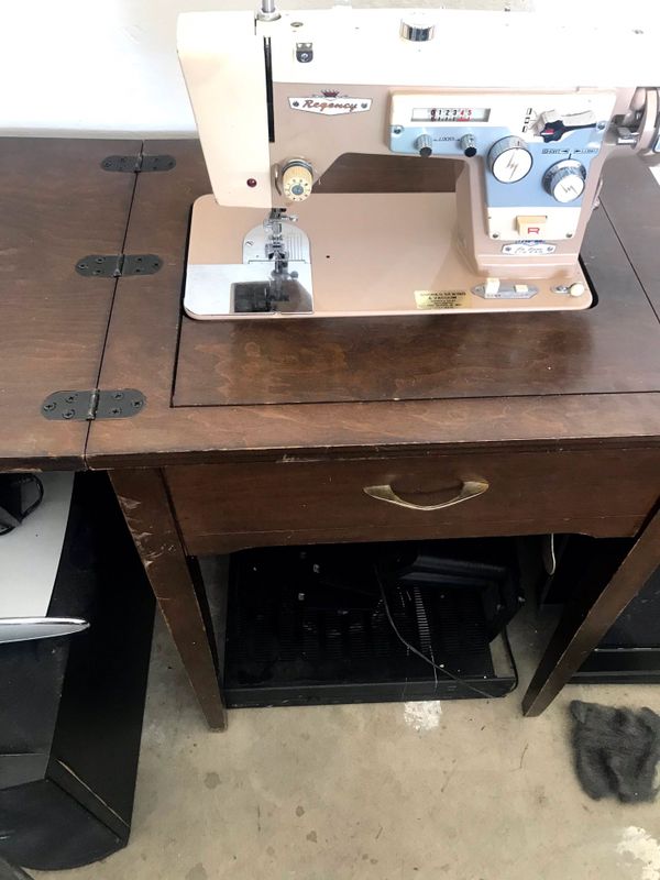 Vintage regency sewing machine in wood cabinet for Sale in 