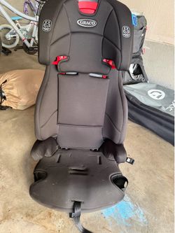 Booster seat with removable back