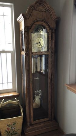 Howard Miller Grandfather clock- solid Oak