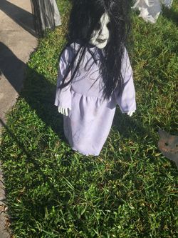 Spirit Halloween Sinister Doll 