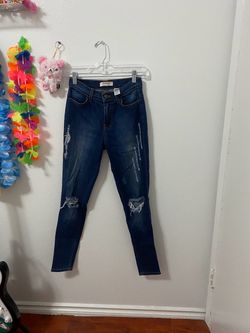 Vibrant ripped jeans