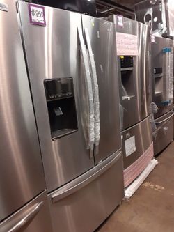 New scratch and dent Whirlpool french doors fridge stainless steel with 6 months warranty