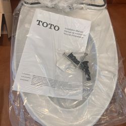 NEW TOTO SS124-01  SoftClose Elongated Toilet Seat in Cotton White, new in box 