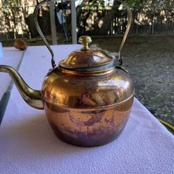 Antique copper kettle