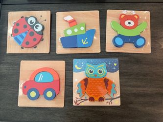 “NEW Wooden Puzzles – $2 each or all 5 for $10.”