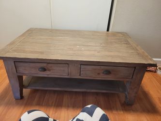 Wooden coffee table with drawers