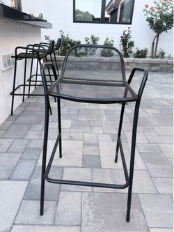 Black metal outdoor stools