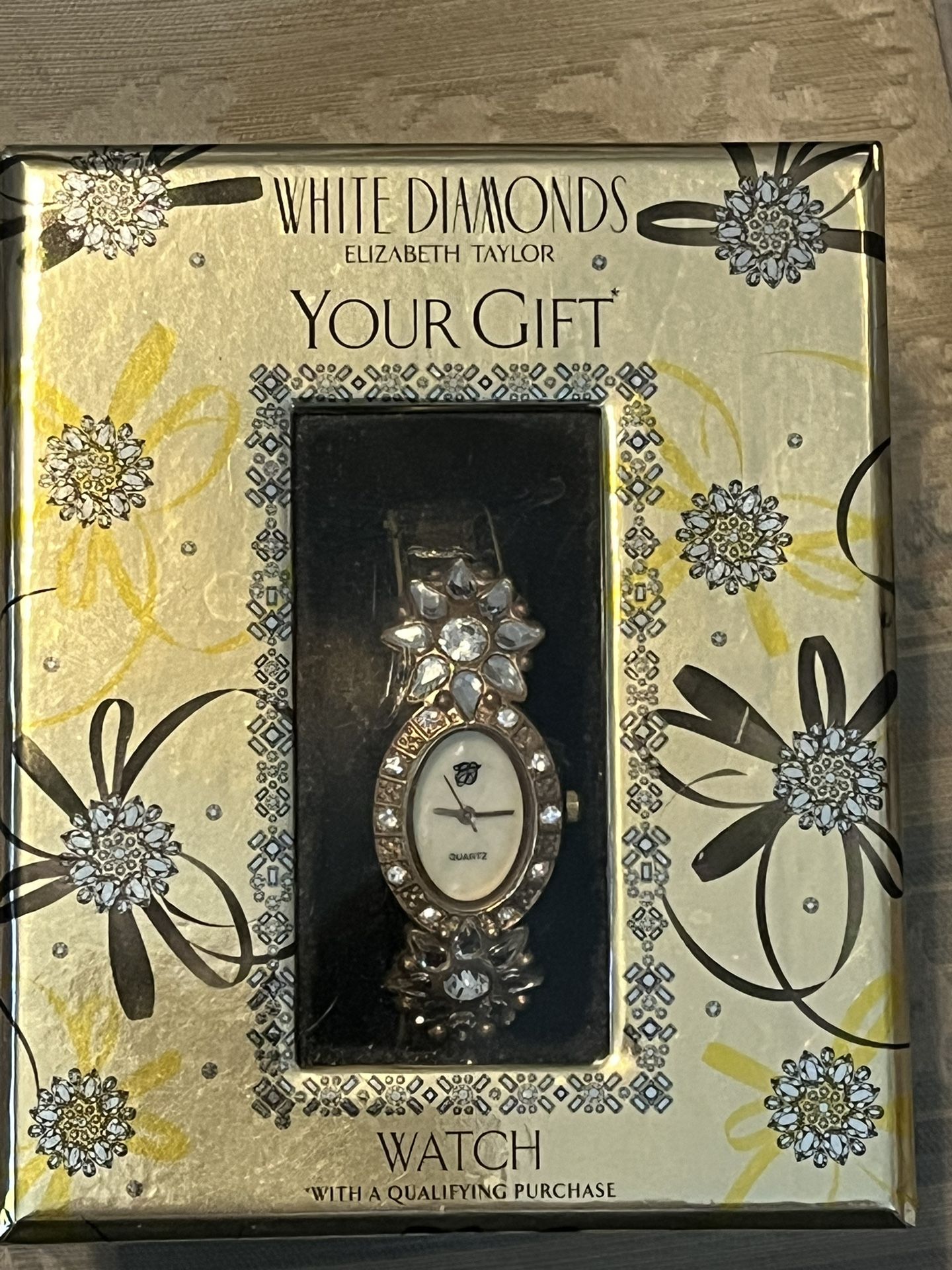 FREE Vintage Elizabeth Taylor White Diamonds anniversary quartz watch.