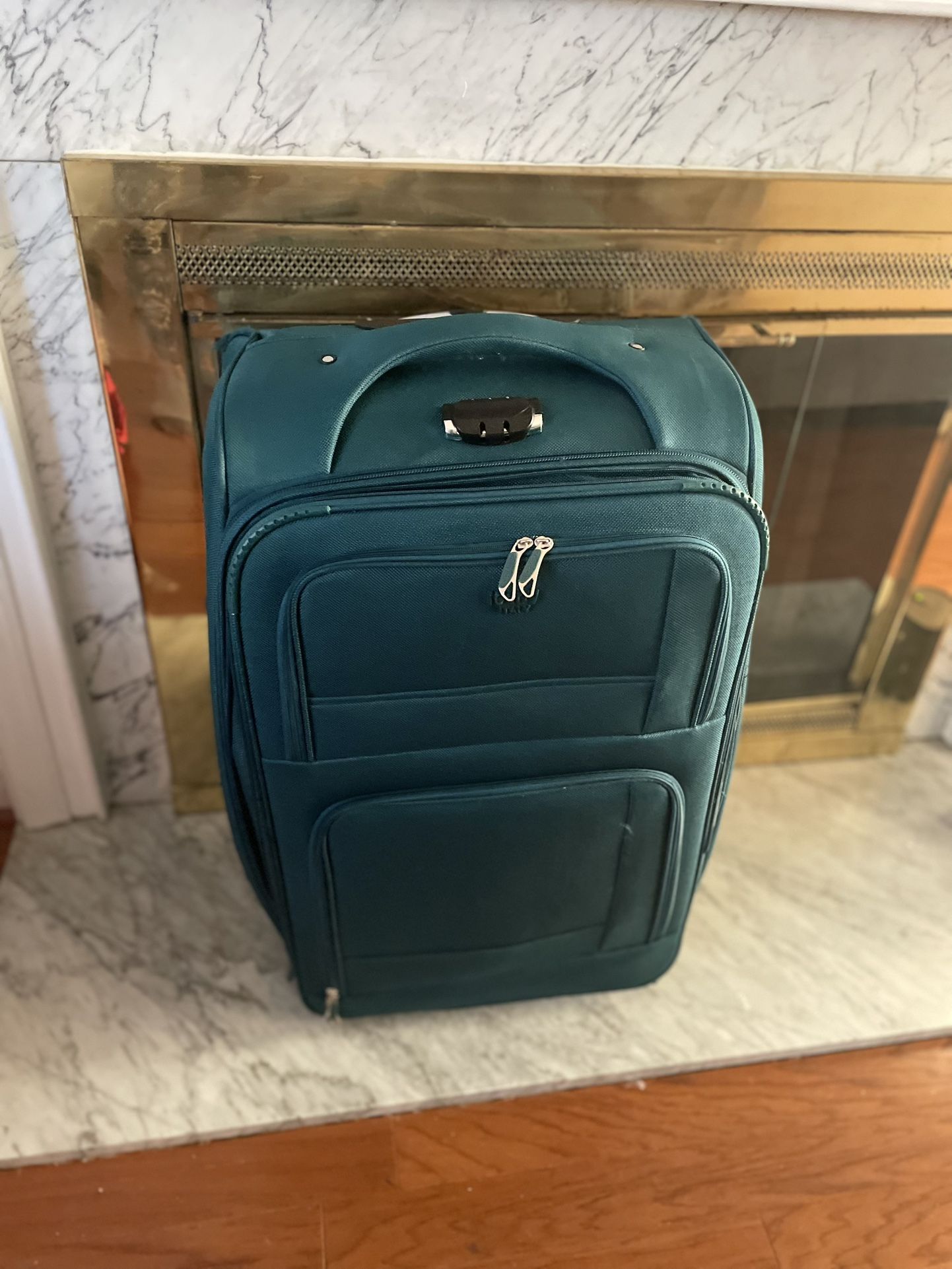 Sleek Teal Rolling Suitcase - Expandable, TSA-Lock, Travel-Ready