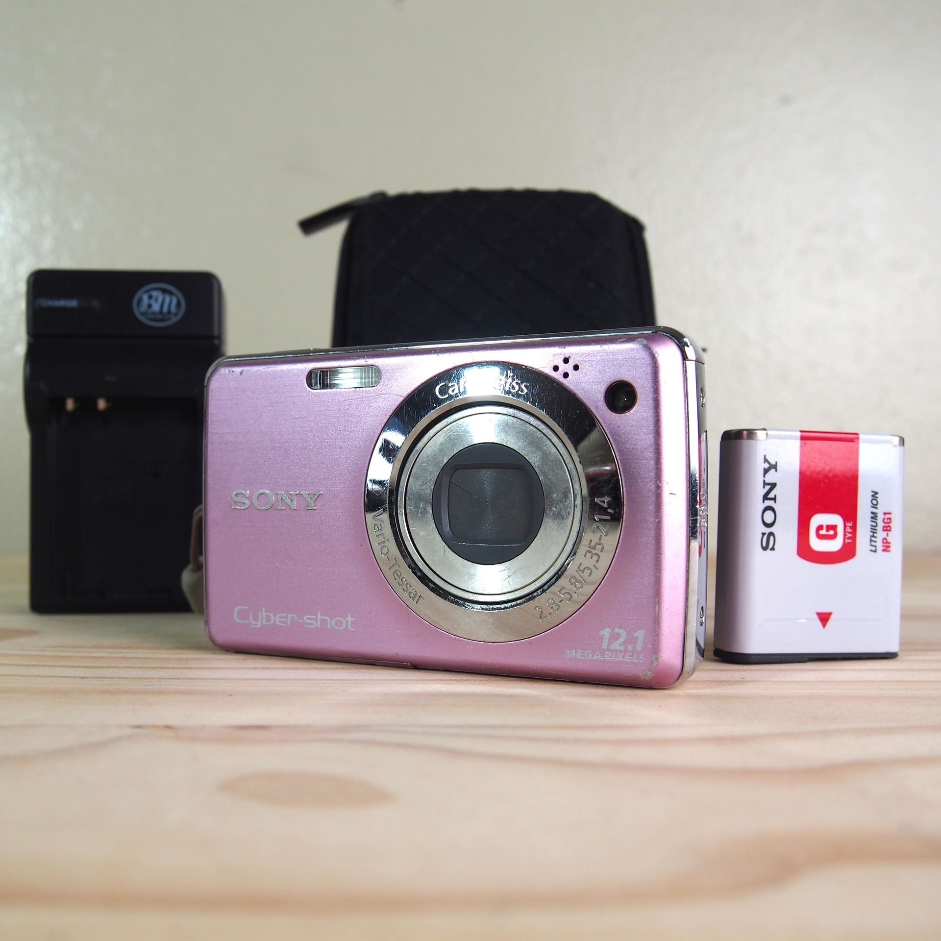 Sony CyberShot DSC-W210 12.1MP Digital Camera Pink Bundle Tested Fully Works Comes with Camera Charger Battery Wrist Strap Carrying Case / Protective