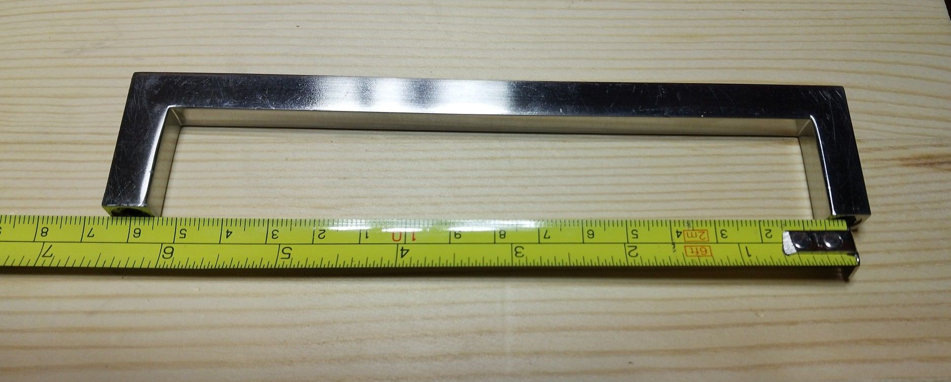 Modern  nickel cabinet pulls. New in wrapper. Kitchen remodel hardware
