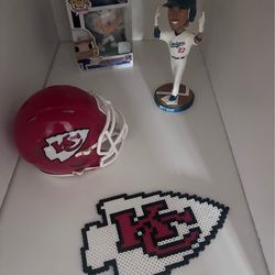 Bobble head, helmet, and pop sports