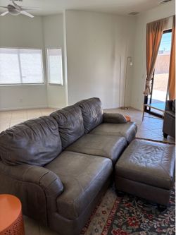Leather sofa, chairs, and ottoman