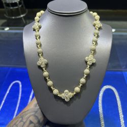 Yellow gold moissanite clover ball link chain