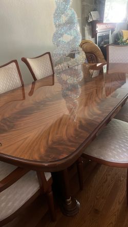 Large extendable formal dining  table n chairs