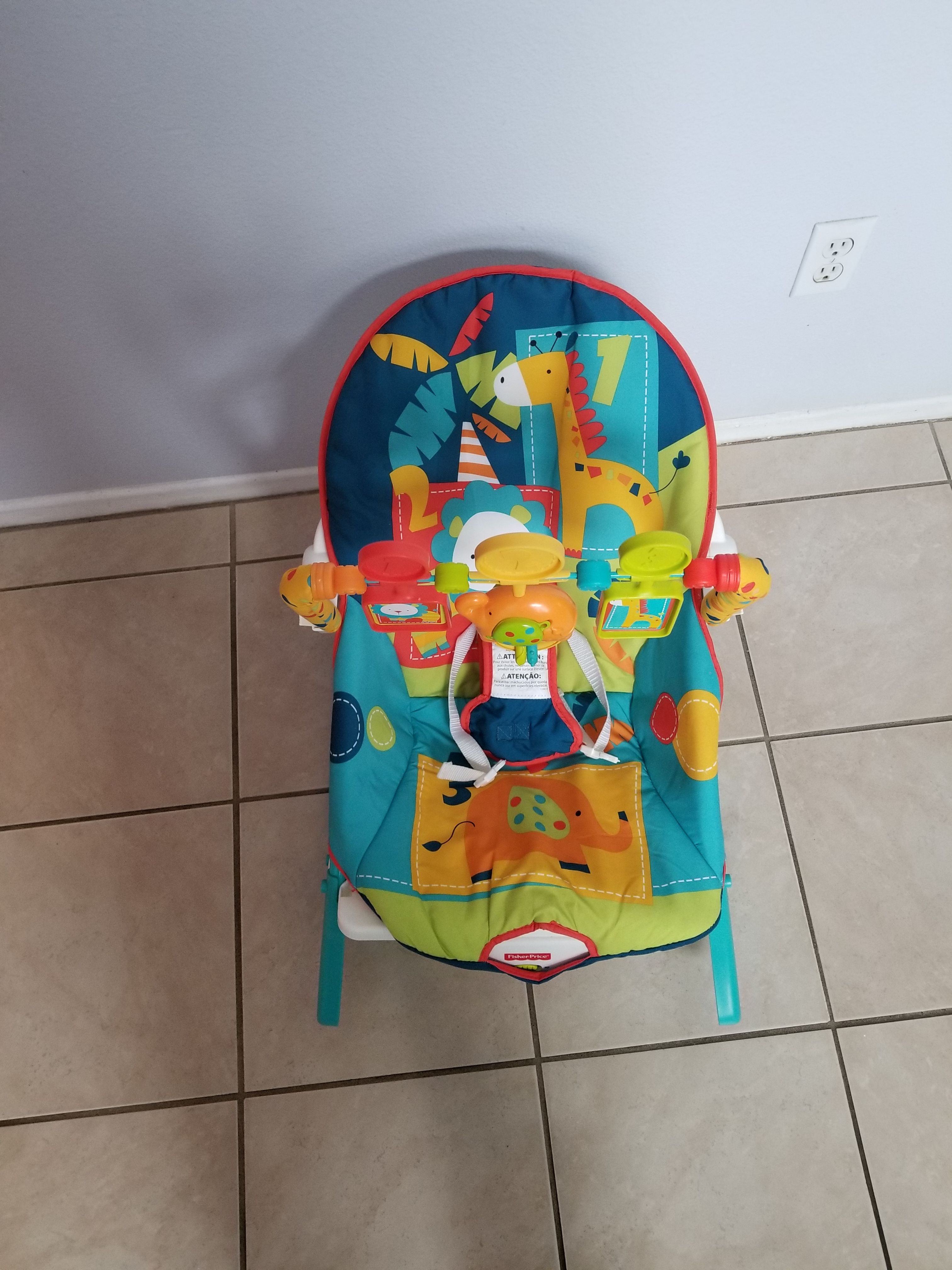 Fisher price bouncer/reclining chair...like new only use 2 months