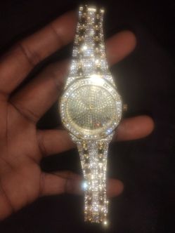 Gold plated watch with diamond cut
