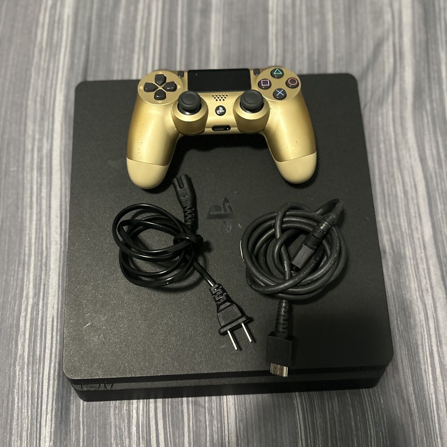 Playstation 4  slim ( controller is extra )