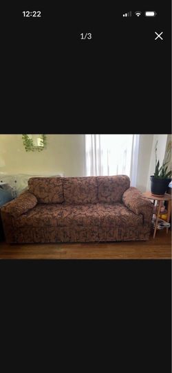 Large Floral design Fabric  Upholstered Sofa Send best offer for Brown large couch. In good condition. It is pretty LARGE size. Must pick up with spac