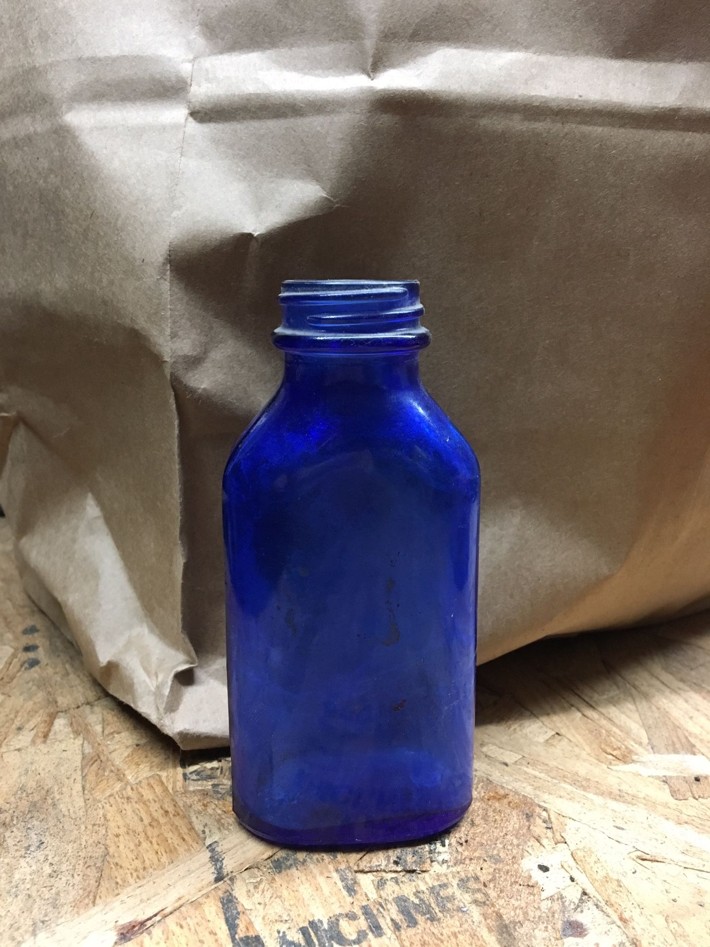 Blue med bottle