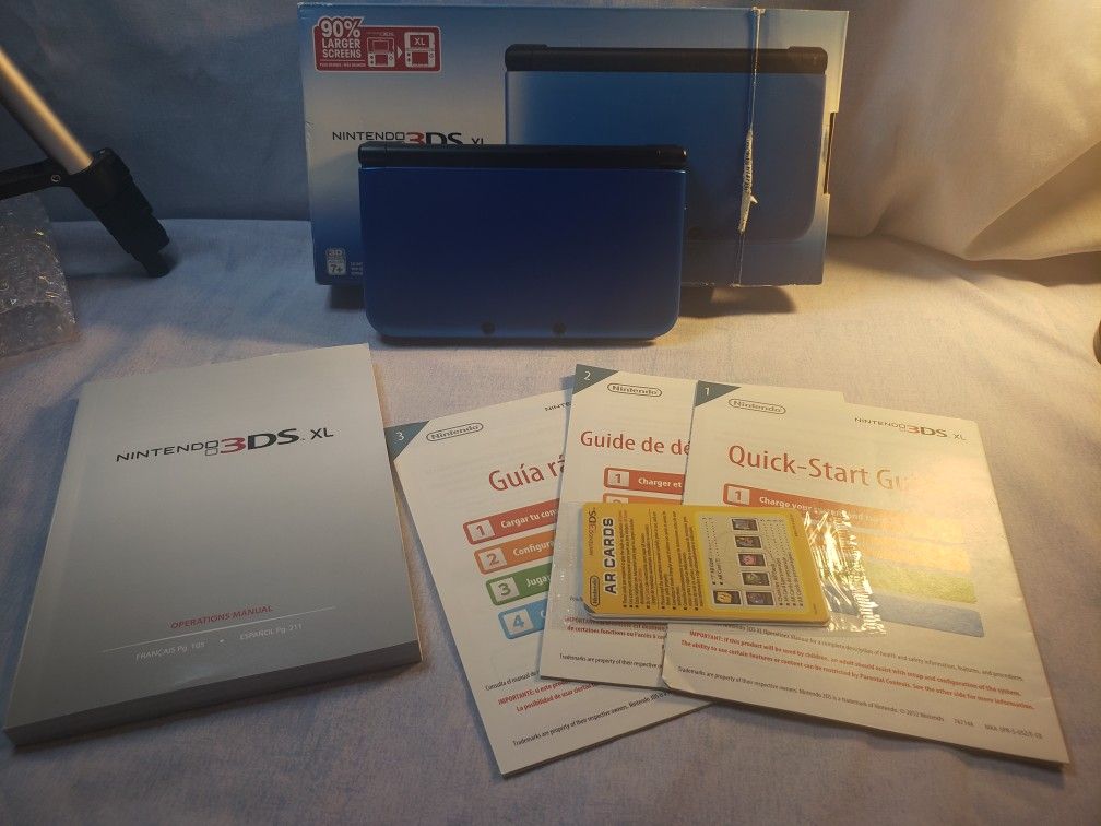 Nintendo 3DS XL With 5,000+ Games original box with manuals and play cards