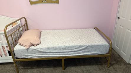 Twin size bed frame with mattress
