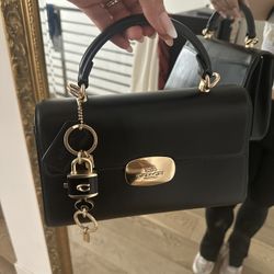Coach Eliza Top Handle bag in black smooth leather 