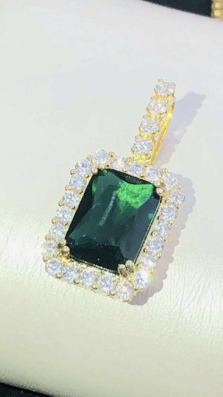 Brand new emerald charm with necklace included