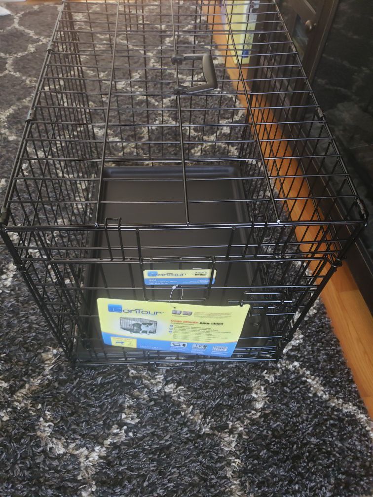 New small dog crate never used