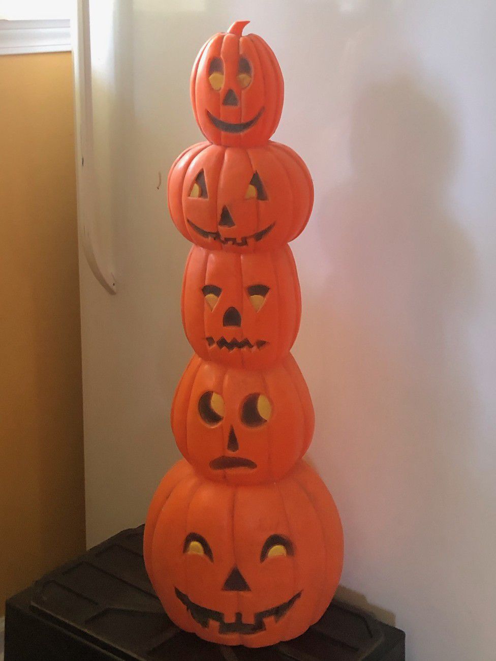 Stack plastic pumpkins