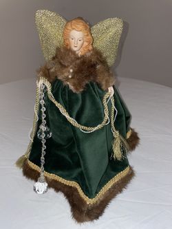 This item is a vintage angel tree topper