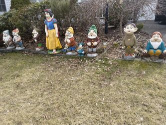 Vintage Snow White and the seven dwarfs cement garden statues