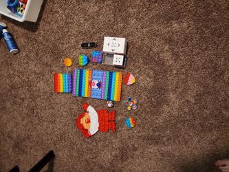 Pop Its, Fidget Toys, Gan Cube, And Teck Deck 
