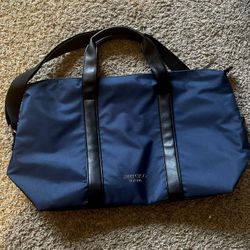 Jimmy Choo navy blue travel bag