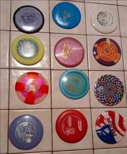 12-Disc Disc Golf Lot - Innova Wraiths, Custom Dyes, Premium Plastics