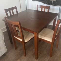 Small Table with four Chairs 