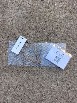 coach gold tone bracelet