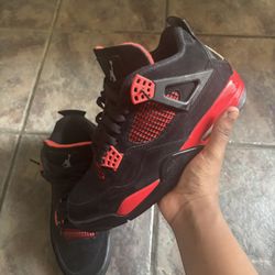 Red Thunder Jordan 4s