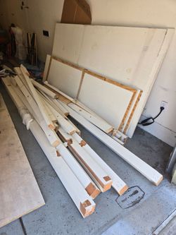 Free wood board Three 8' x 4x wooden beams 11'
