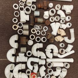 60+ 1 1/2" PVC And Other Assorted Plumbing Fittings